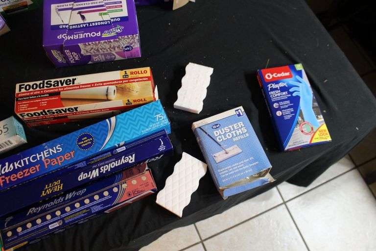 Reynolds Wrap, Swiffer Pads, Mr. Clean Magic Erasers, Pack Mate Vacu-Seal, Size Medium Rubber Gloves, and Misc.