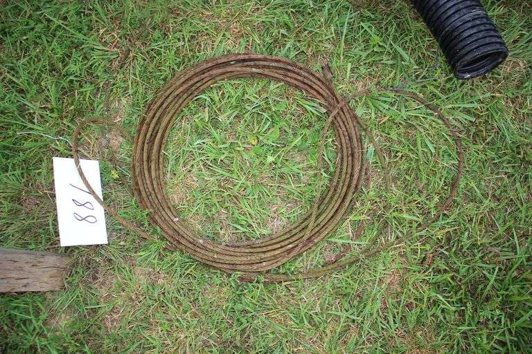 (2) Saw Horses, Cable, (2) Flower Pots, (4) Pieces of 4 Inch Drain Pipe, and Misc. Rope Pieces