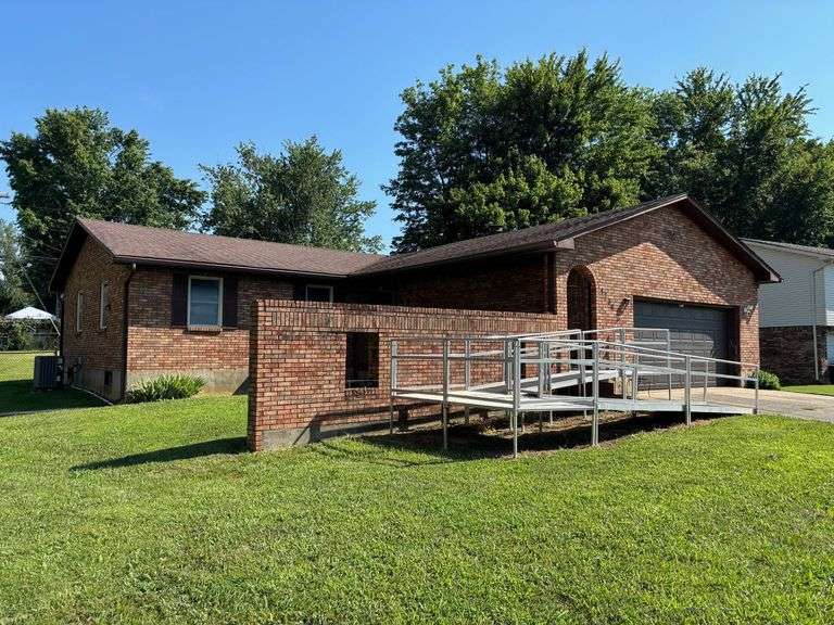 HOME - ATTACHED GARAGE - CITY LOT