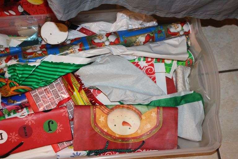 Christmas Wrapping Paper, Rubbermaid Slimfit Wheeled Underbed Box, Stuffed Snoopy, Santa Figurine, Stuffed Decorations, Gift Bags, Holiday Bowls, Angel Figurines, and Misc. Decorations