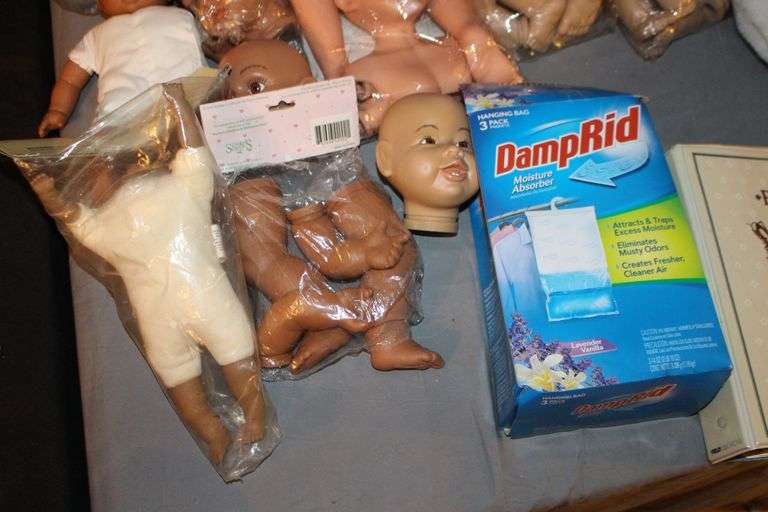 Poly-Fil Fiber Batting, Xyron 5 Inch Creative Station, Baby Doll Heads and Parts, Craft Book, License Frame, and Misc.