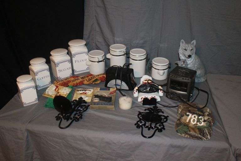 (4) Canisters with Sealing Lids, (4) Decorative Canisters, Wolf Statue, Alarm Clock, Wall Decorations, Tape Cleaner, and Misc. image