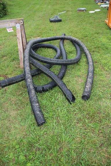 (2) Saw Horses, Cable, (2) Flower Pots, (4) Pieces of 4 Inch Drain Pipe, and Misc. Rope Pieces