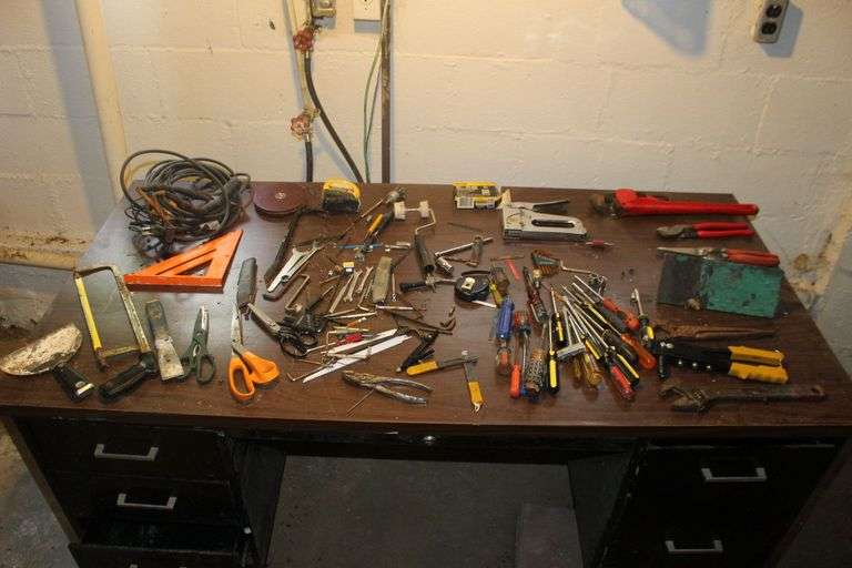18 Inch Pipe Wrench, Screwdrivers, Rivet Gun, Adjustable Wrenches, Scissors, Staple Gun, Speed Square, 1/4 Inch Staples, and Misc. image