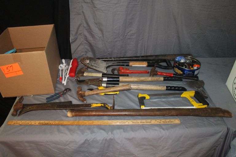Shovel, Pruners, Stanley Saw, Wooden Baseball Bat, Claw Hammers, Craftsman 10 Inch Pipe Wrench, Pry Bar, and Misc. Tools image