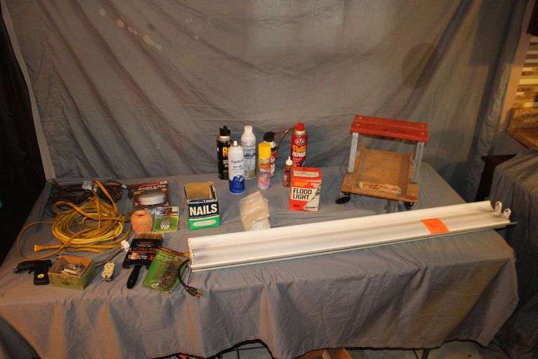 Fluorescent Light Fixture, Electrical Cords, EZ Cart Seat, Hanger Brackets, Flood Light, Air Duster, Smoke and Fire Alarm, 3/8 Inch Staples, and Misc.