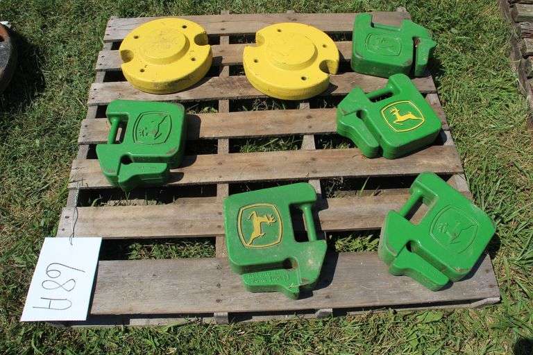 (5) 40 Lb. John Deere Tractor Weights, and (2) 50 Lb. John Deere Rear Wheel Weights image