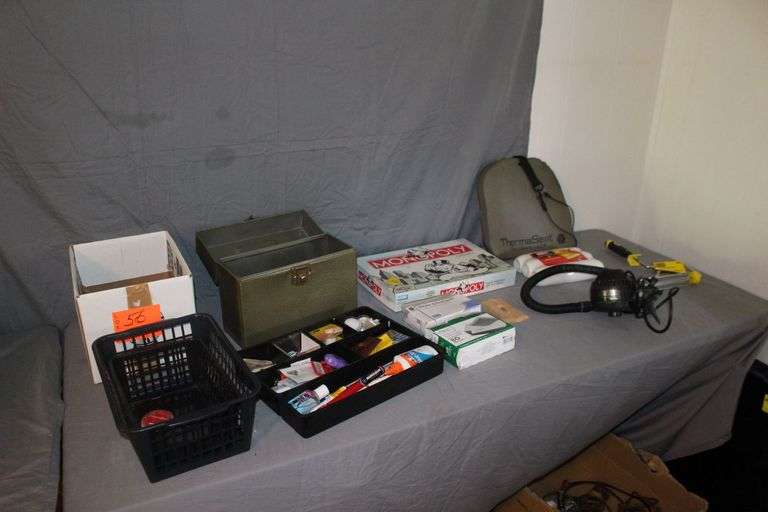 Metal Box, Monopoly Board Game, Extension Cords, Envelopes, (2) Plastic Baskets, Paint Roller, Office Supplies, and Misc. image