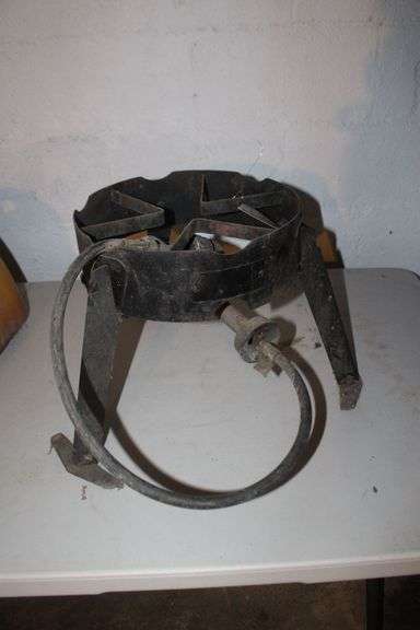 Propane Cooker Stand, Metal Fuel Can, and 5 Gallon Plastic Gas Can