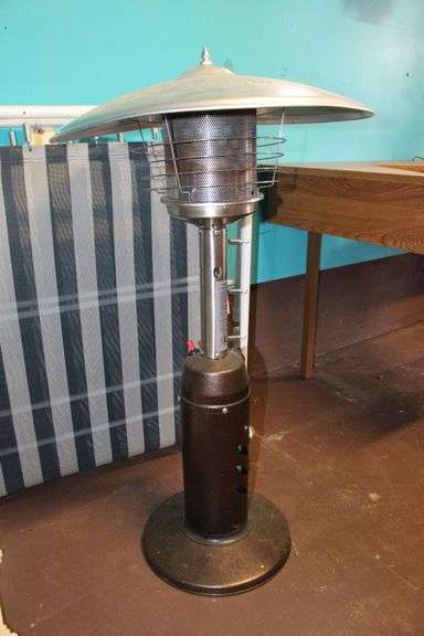 (2) Folding Cots, Standing Heater, Fan, Metal Flower Stand Bench, Kingsford Charcoal, and Type 1 Tile Adhesive