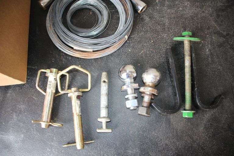 (2) 1 7/8 Inch Balls, Hitch Pins, 4-Way Lug Wrench, Wire, and Misc. image