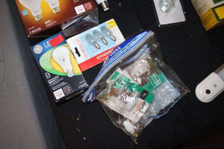 Light Bulbs, Watering Can, Cleaning Wipes, Pressure Washer Concentrate, Glass Cutting Board, Brush, and Misc.