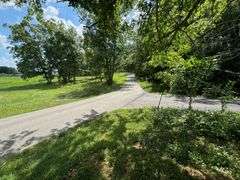 PARCEL 1: LOG HOME - BASEMENT - GARAGE - 1.2 ACRES: 487 Quiggins Lane, Leitchfield, KY 42754