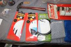 (2) Yard Sticks, Golf Club Grips, Mens Small and Womens Large Golfing Gloves, Peg Board Pegs, Fabric, Claw Hammer, Ribbon, Crafting Supplies, and Misc.