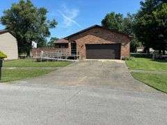 HOME - ATTACHED GARAGE - CITY LOT