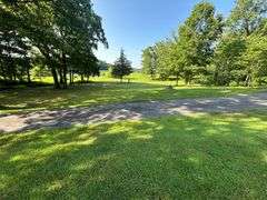 PARCEL 1: LOG HOME - BASEMENT - GARAGE - 1.2 ACRES: 487 Quiggins Lane, Leitchfield, KY 42754