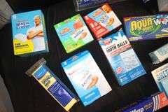 Reynolds Wrap, Swiffer Pads, Mr. Clean Magic Erasers, Pack Mate Vacu-Seal, Size Medium Rubber Gloves, and Misc.