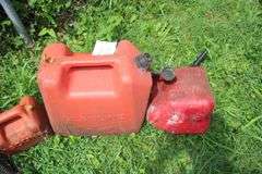 1 Gallon Gas Can, (2) 2 Gallon Gas Cans, 5 Gallon Gas Can, and (2) Sprayers