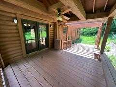 PARCEL 1: LOG HOME - BASEMENT - GARAGE - 1.2 ACRES: 487 Quiggins Lane, Leitchfield, KY 42754