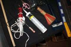 Waterproof Sealer, Ortho Insect Killer, Hand Saw, Fire Extinguisher, Caulk, Caulk Gun, Screws, Clover Needlecraft, and Misc.