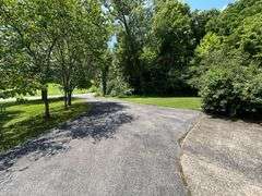 PARCEL 1: LOG HOME - BASEMENT - GARAGE - 1.2 ACRES: 487 Quiggins Lane, Leitchfield, KY 42754