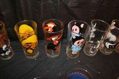 Looney Toon Glasses, (9) 2010 Derby Glasses, E.T Glasses, 2003 Derby Glass, and Misc. Decorative Glasses