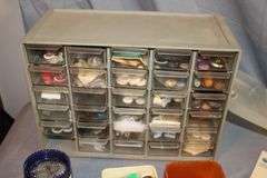Sewing Thread, Gorilla Glue, Plastic Bolt Bin, Buttons, Table Cloths, Sewing Machine Parts, Gift Tags, and Misc.