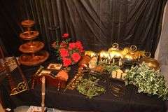 Wooden Coat Rack, Plant Stand, Bicycle Decoration, 3 Tier Wooden Serving Tray, Stuffed Bears, Broom, Elephant Decorations, and Misc. Decorations