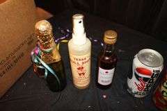 Drummer Figurine, Coasters, Soda Cans, and Misc. Glass Bottles