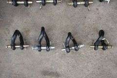 (3) 1 x 5 5/16 Clevises, (4) Twisted Clevises, 15/16 x 4 5/8 Clevis, and 7/8 x 3 1/4 Clevis