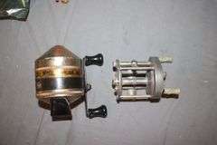 (2) Minnow Buckets, Zebco Omega Reel, PFlueger Reel, Ear Muffs, Bobbers, and Misc. Fishing Tackle