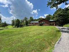 PARCEL 1: LOG HOME - BASEMENT - GARAGE - 1.2 ACRES: 487 Quiggins Lane, Leitchfield, KY 42754