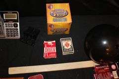 Po-Ke-No Game, How to Play Books, Family Feud Game, Bowling Balls, Suitcase, Playing Cards, Football, Desk Lamp, and Misc.