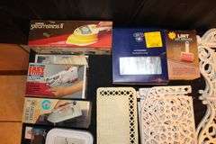 Easy Stitch Sewing Machine, Seamstress Garmet Steam Iron, Wall Decorations, (2) Electric Irons, License Plate, Peanuts Figurines, and Misc.