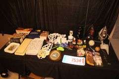 Easy Stitch Sewing Machine, Seamstress Garmet Steam Iron, Wall Decorations, (2) Electric Irons, License Plate, Peanuts Figurines, and Misc.
