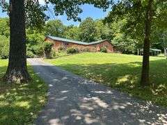 PARCEL 1: LOG HOME - BASEMENT - GARAGE - 1.2 ACRES: 487 Quiggins Lane, Leitchfield, KY 42754
