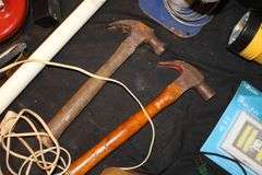 (2) Claw Hammers, Belden Electrical Wire, Electrical Cord, Abrasive Blade, Weatherstrip Tape, Lights, and Misc.