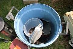 Sunbeam Grill, Rubbermaid Trash Can, Gott Cooler, and Simply 10.5 Gallon Metal Trash Can