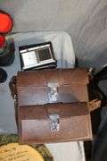 DVD Cases, Belmont Binoculars, Kodak Record Player, DVD Player, Clock Radio, Headphones, Camera Bag, and Misc.