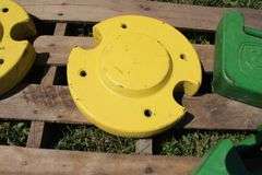 (5) 40 Lb. John Deere Tractor Weights, and (2) 50 Lb. John Deere Rear Wheel Weights
