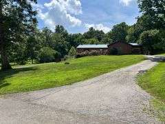 PARCEL 1: LOG HOME - BASEMENT - GARAGE - 1.2 ACRES: 487 Quiggins Lane, Leitchfield, KY 42754