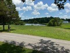 PARCEL 1: LOG HOME - BASEMENT - GARAGE - 1.2 ACRES: 487 Quiggins Lane, Leitchfield, KY 42754