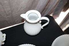 Kaiser Teapots, Serving Plates, Plates, Bowls, Saucers, Cups, Soup Tureens, Sugar Canister, and Gravy Boat