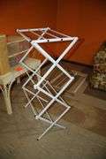 Wicker Coffee Table, Folding Shoe Rack, 4 Drawer Plastic Container, 2 Tier Rack, 4 Tier Rack, and 7 Drawer Cart on Wheels