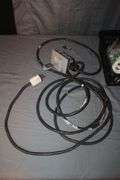 (4) Power Strips, Pittsburgh 2 Ton Jack, Jumper Cables, Electrical Cords, Fan, C-Clamp, Zip Ties, Tire Tool, and Misc.