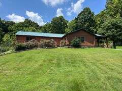 PARCEL 1: LOG HOME - BASEMENT - GARAGE - 1.2 ACRES: 487 Quiggins Lane, Leitchfield, KY 42754