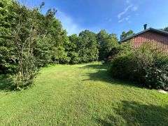 PARCEL 1: LOG HOME - BASEMENT - GARAGE - 1.2 ACRES: 487 Quiggins Lane, Leitchfield, KY 42754