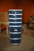 Wicker Coffee Table, Folding Shoe Rack, 4 Drawer Plastic Container, 2 Tier Rack, 4 Tier Rack, and 7 Drawer Cart on Wheels
