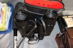 DVD Cases, Belmont Binoculars, Kodak Record Player, DVD Player, Clock Radio, Headphones, Camera Bag, and Misc.