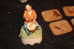 Drummer Figurine, Coasters, Soda Cans, and Misc. Glass Bottles